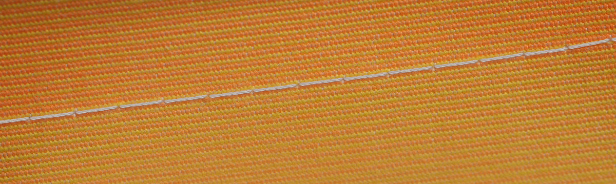 Amann GORE TENARA ePTFE thread stitched into an outdoor textile seam