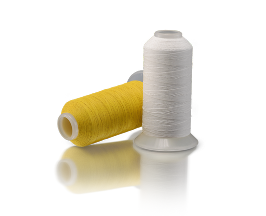 Spools of Amann GORE TENARA ePTFE sewing thread