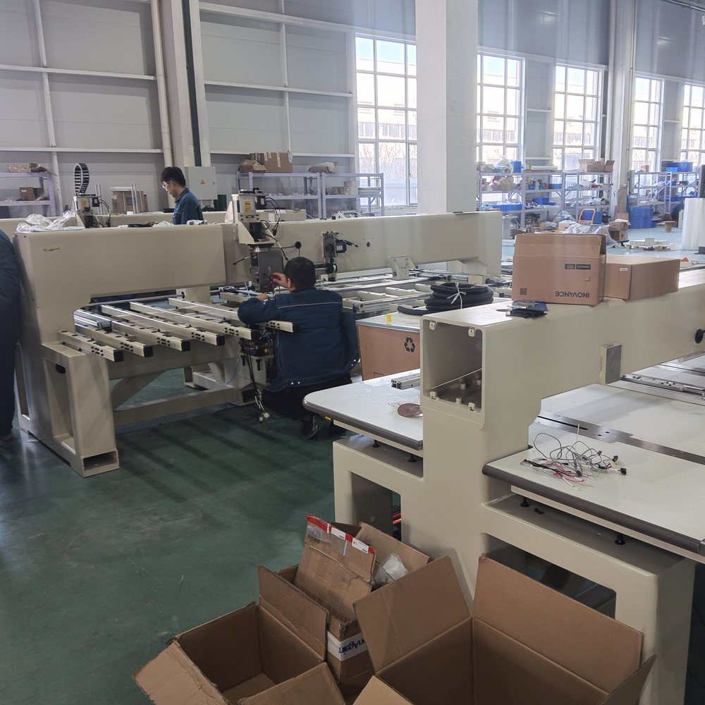 Richpeace automatic perforation, embroidery and sewing machines in a car seat workshop